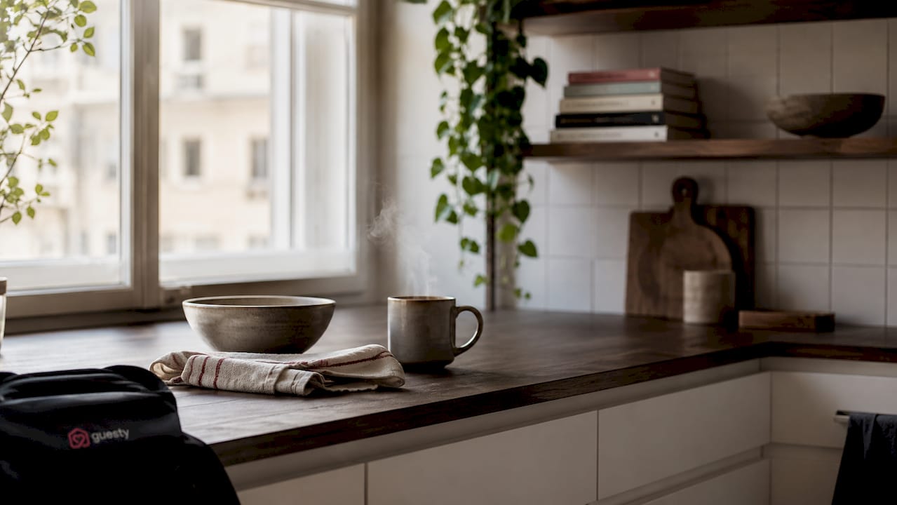Serene kitchen countertop with linen and cup