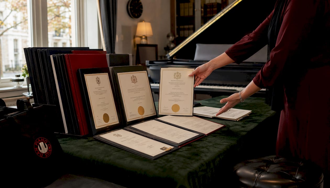 Teacher credentials and certificates on table