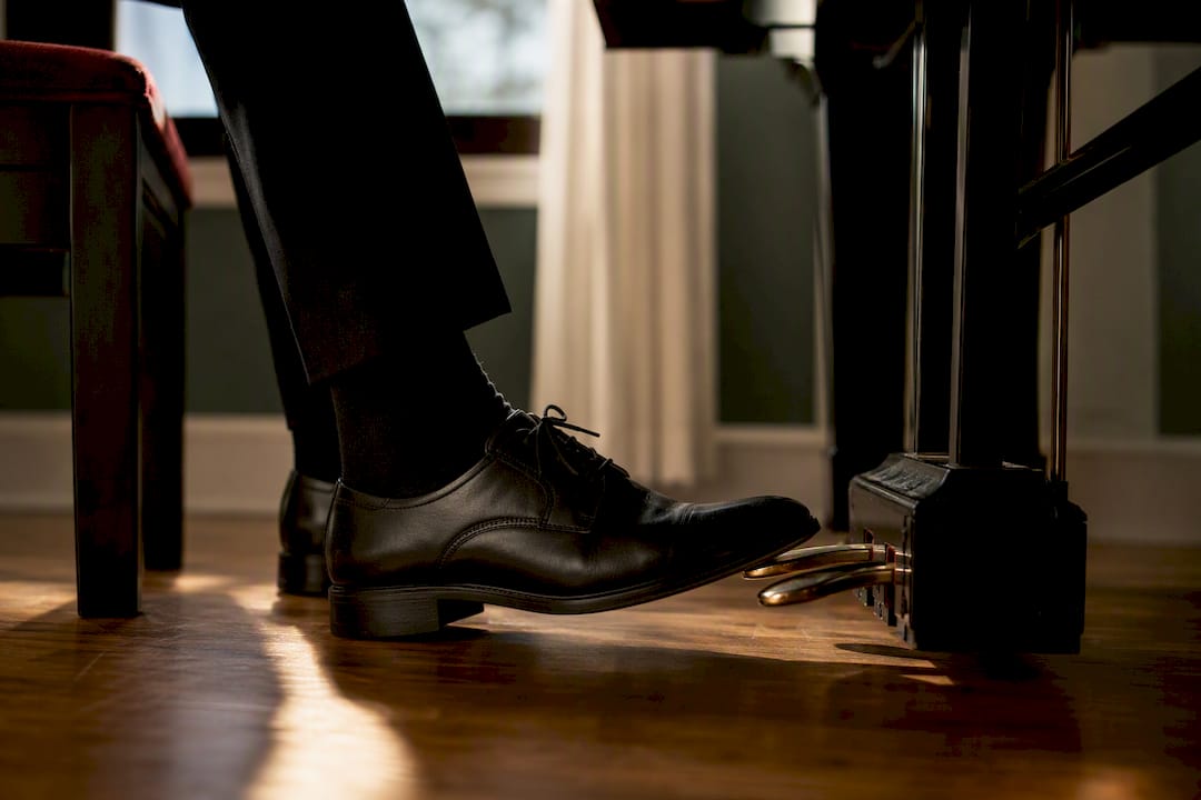 Pianist practising a half-pedalling drill