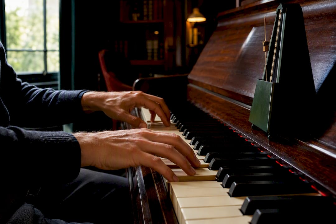 Hands demonstrating staccato and legato touch