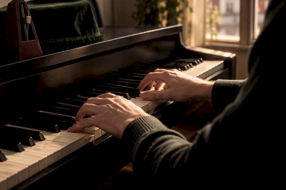Hands practising jazz piano voicings