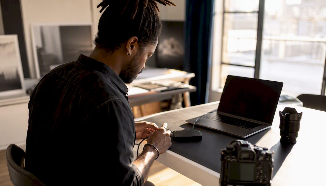 Photographer selecting photos for contest submission