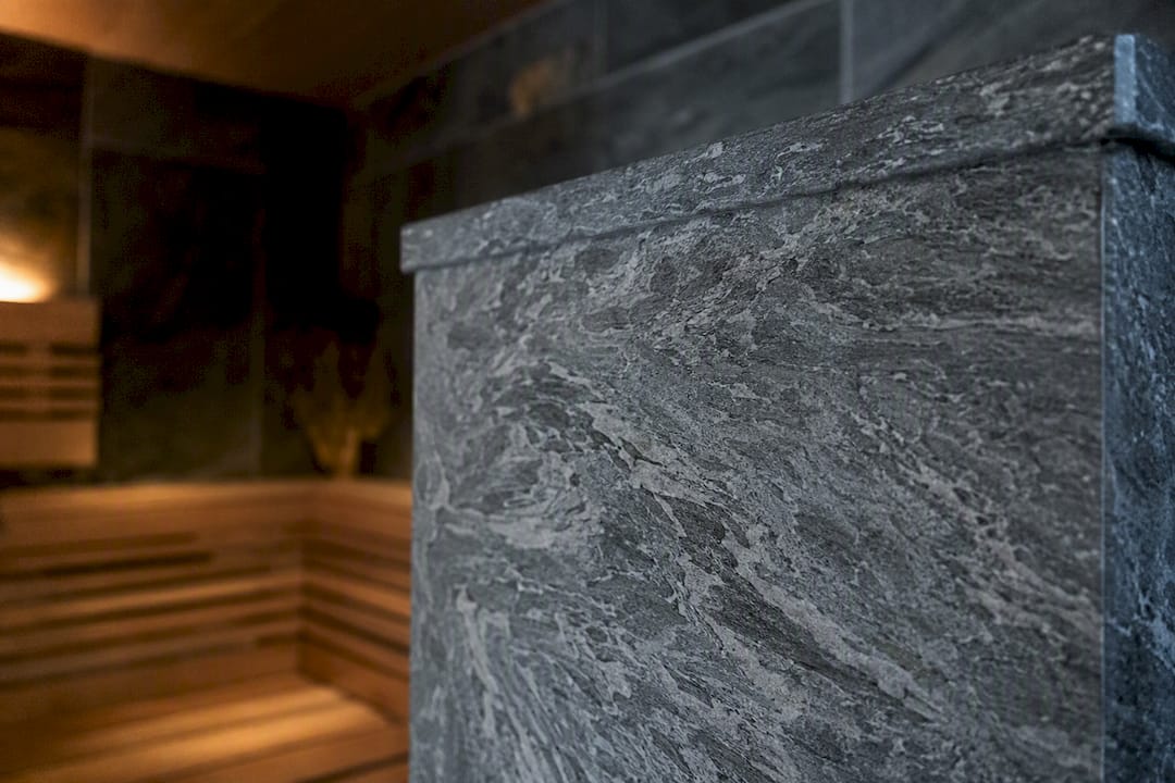 Soapstone sauna heater surround close-up