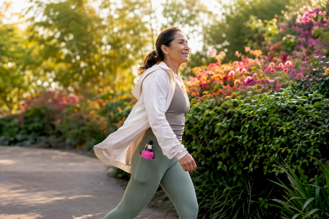 Woman walking outdoors in morning light