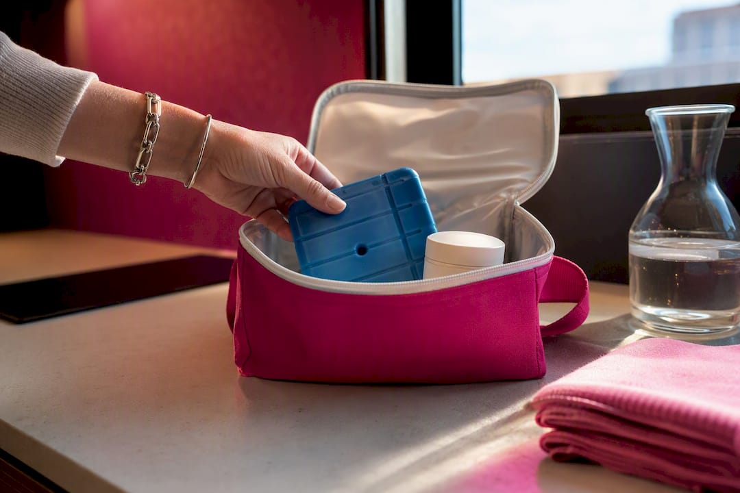 Ice pack beside supplement travel pouch