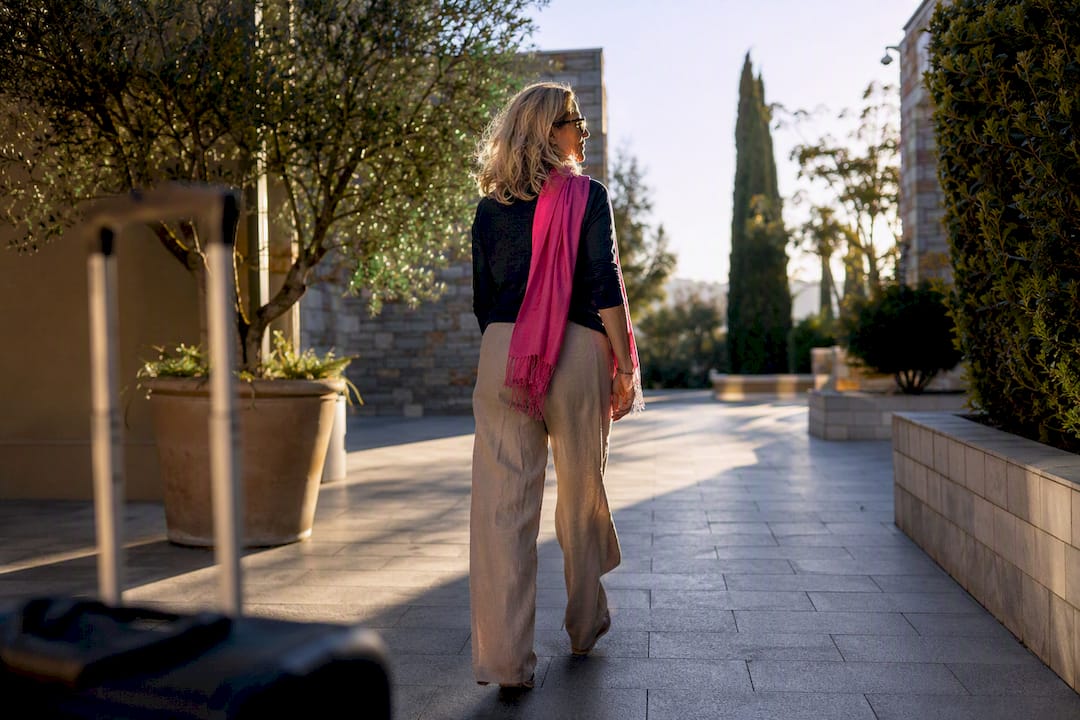Traveler stepping into morning daylight