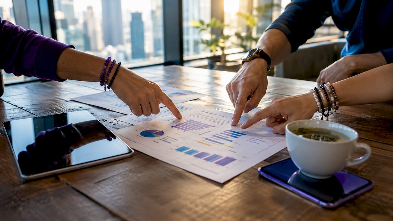 Hands pointing at ad engagement ranking documents