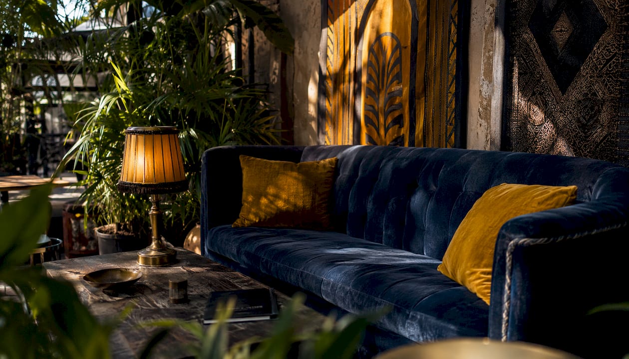 Art Deco jazz room corner with velvet and gold accents