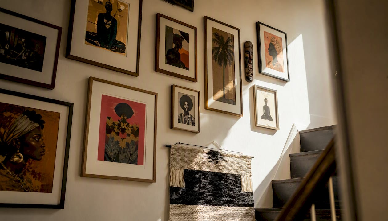 Eclectic and collected gallery wall on staircase