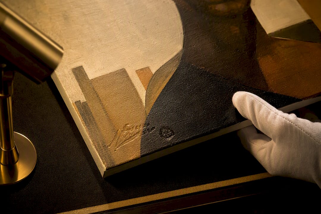 Close-up of canvas signature and edition detail