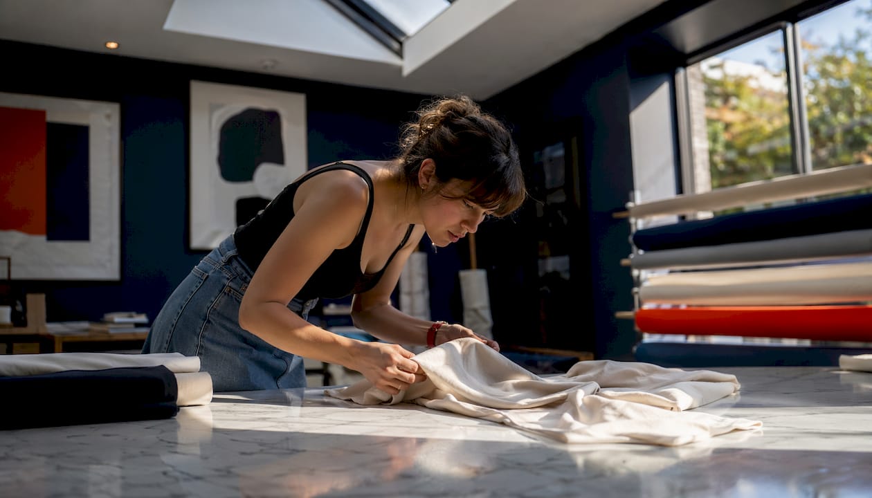 Designer examining French terry fabric loops