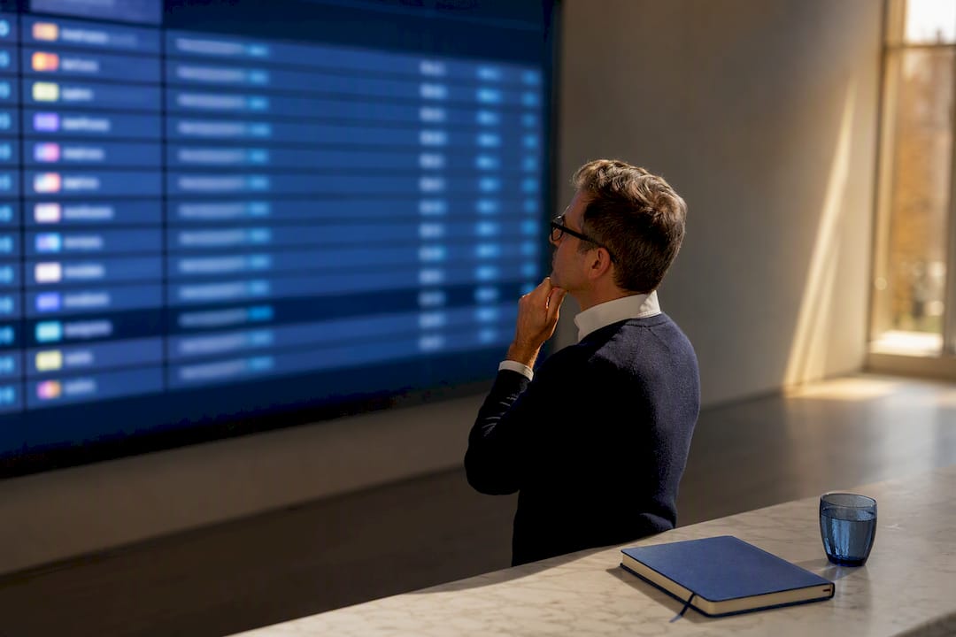 Analyst reviewing largest company rankings
