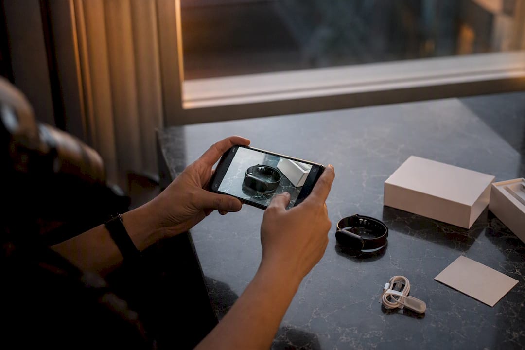 Hands photographing product condition