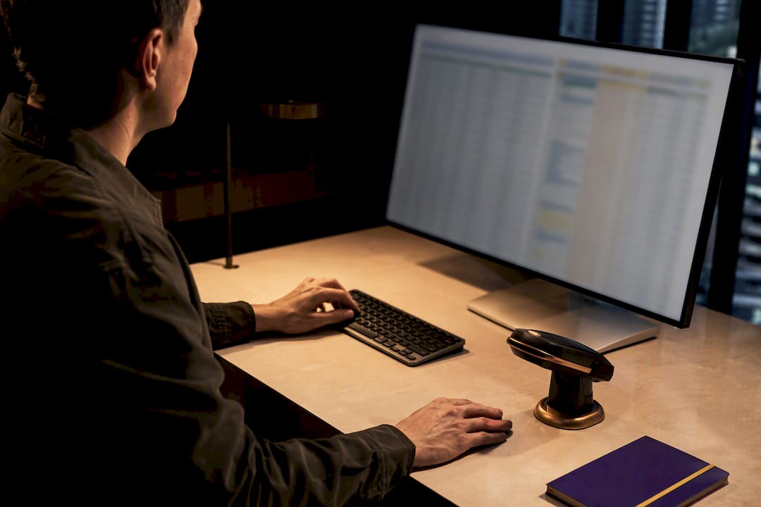 Analyst reviewing distributor price list data