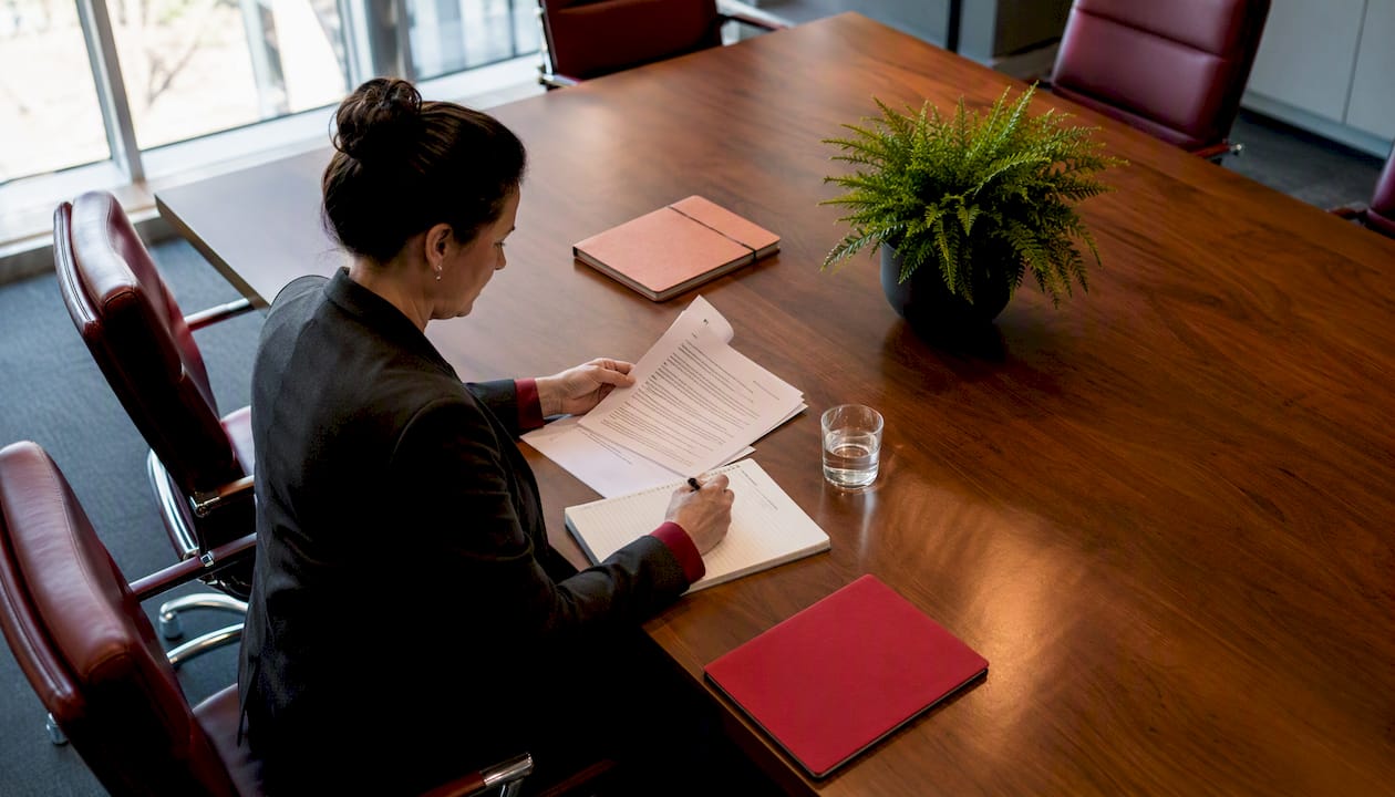 HR professional reviewing grooming policies document