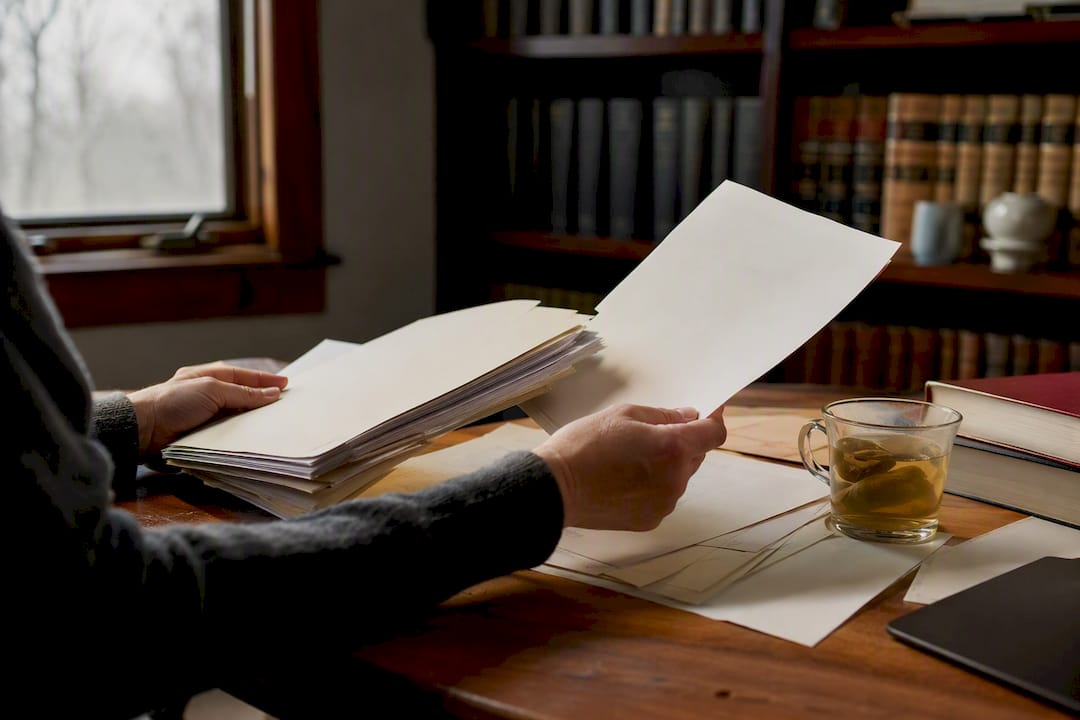 Hands holding civil rights legal documents