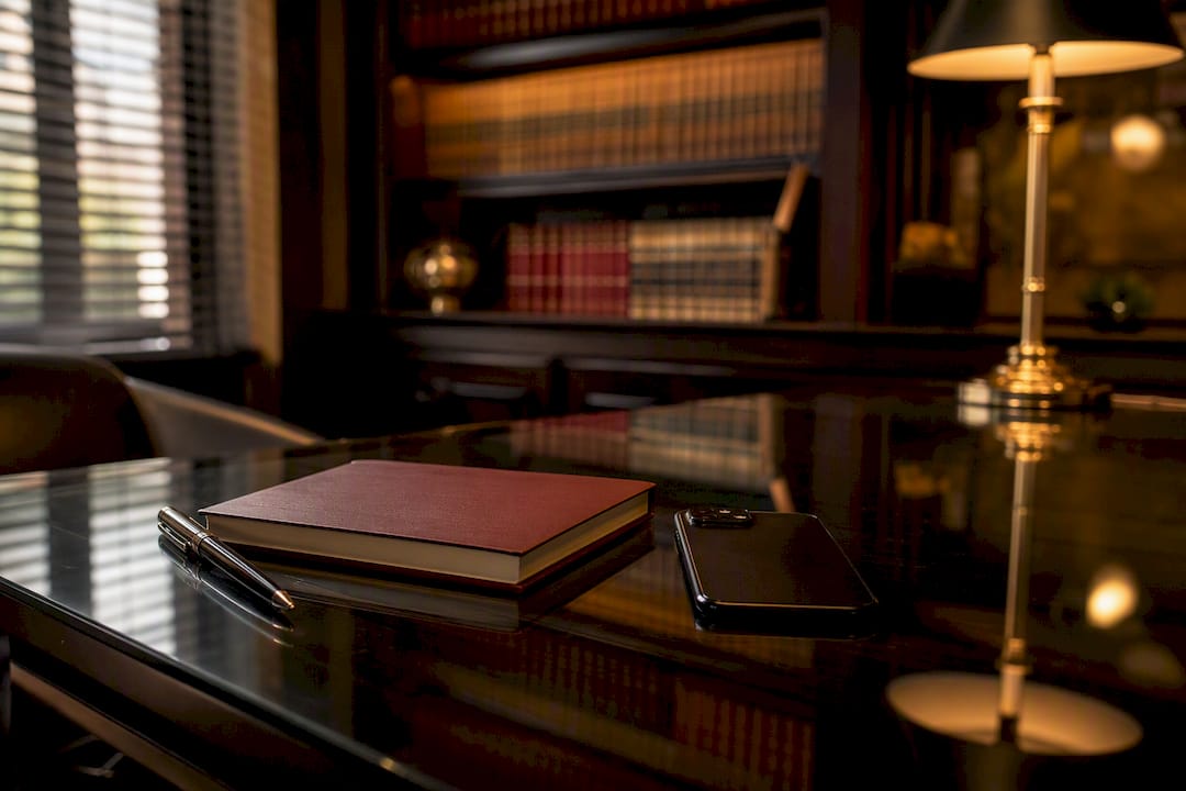 Notebook and smartphone on personal desk
