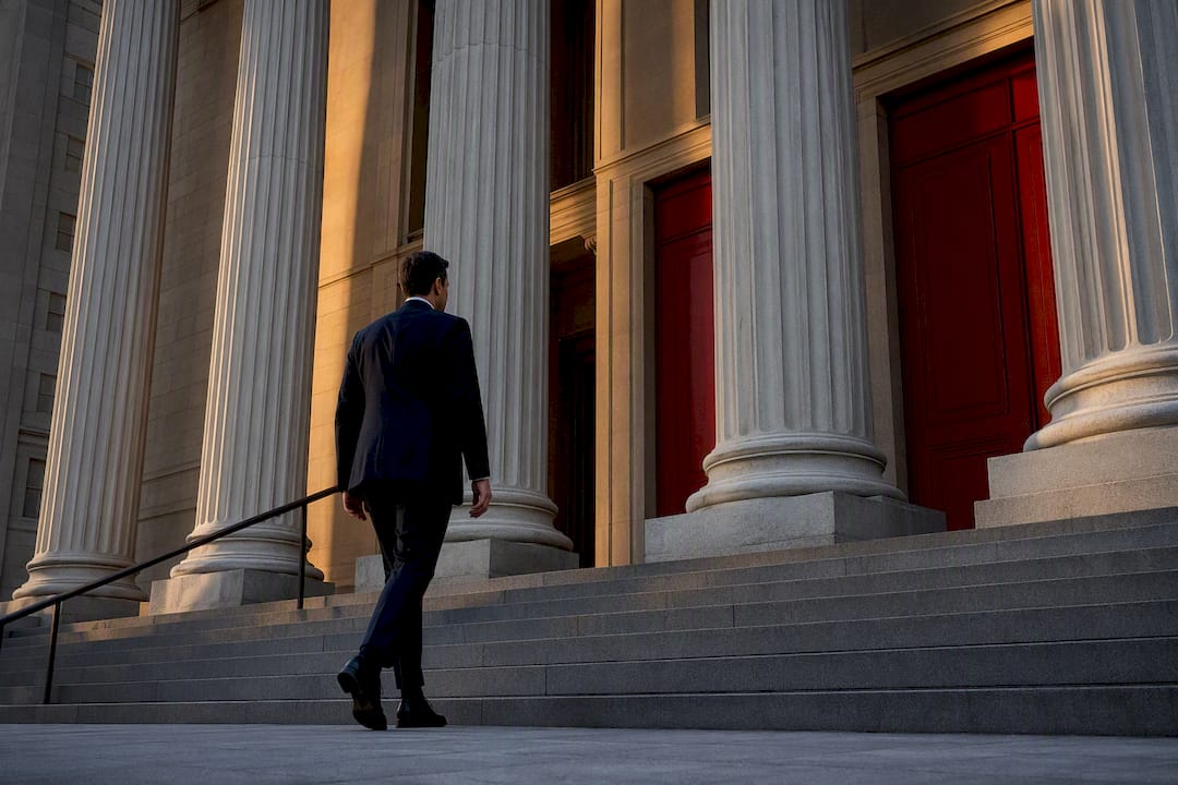 Attorney approaching courthouse entrance