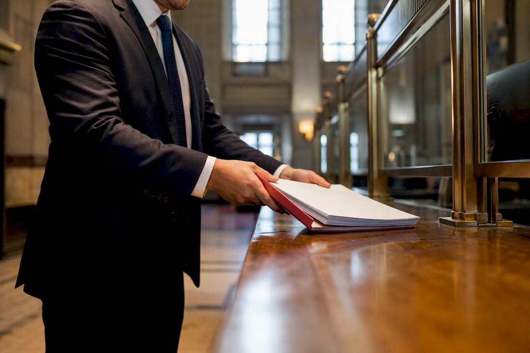 Filing packet at courthouse clerk counter