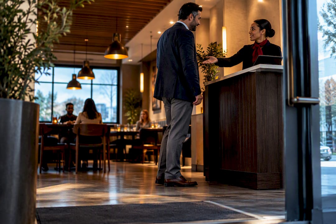 Customer at public accommodation service counter
