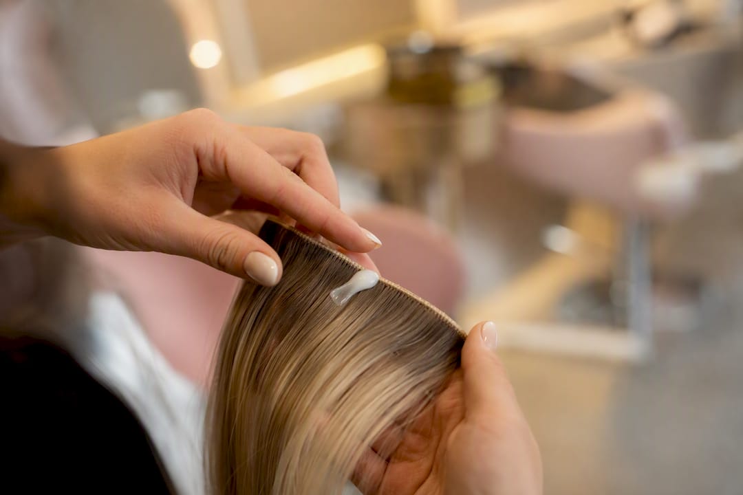 Close-up of strand test with sunscreen on hair extensions