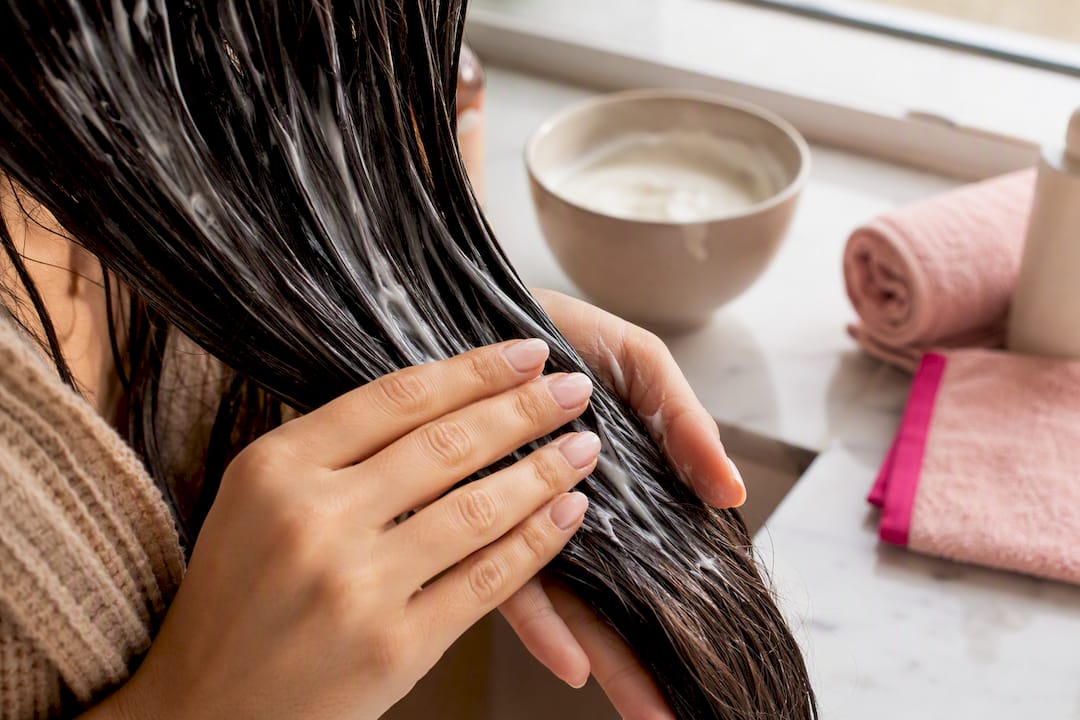 Deep conditioner applied to damp hair