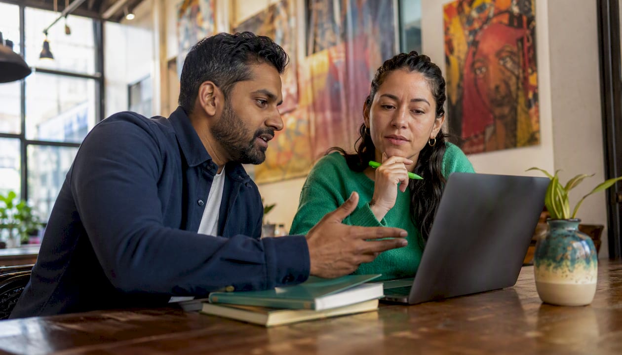 Team discussing refund processing steps