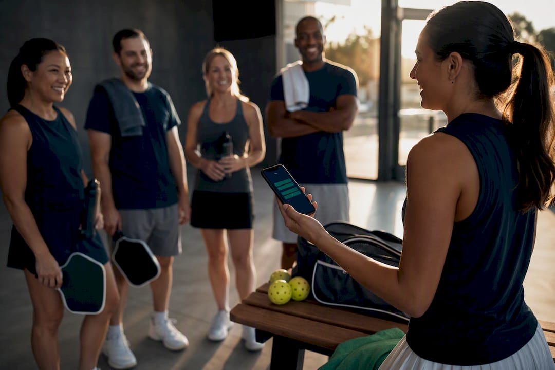 Organizer confirming pickleball fee RSVPs