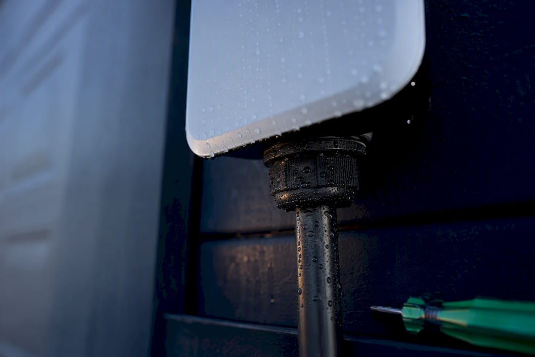 Weather-sealed EV charger conduit entry