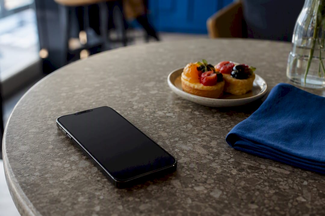 Mobile phone on restaurant table