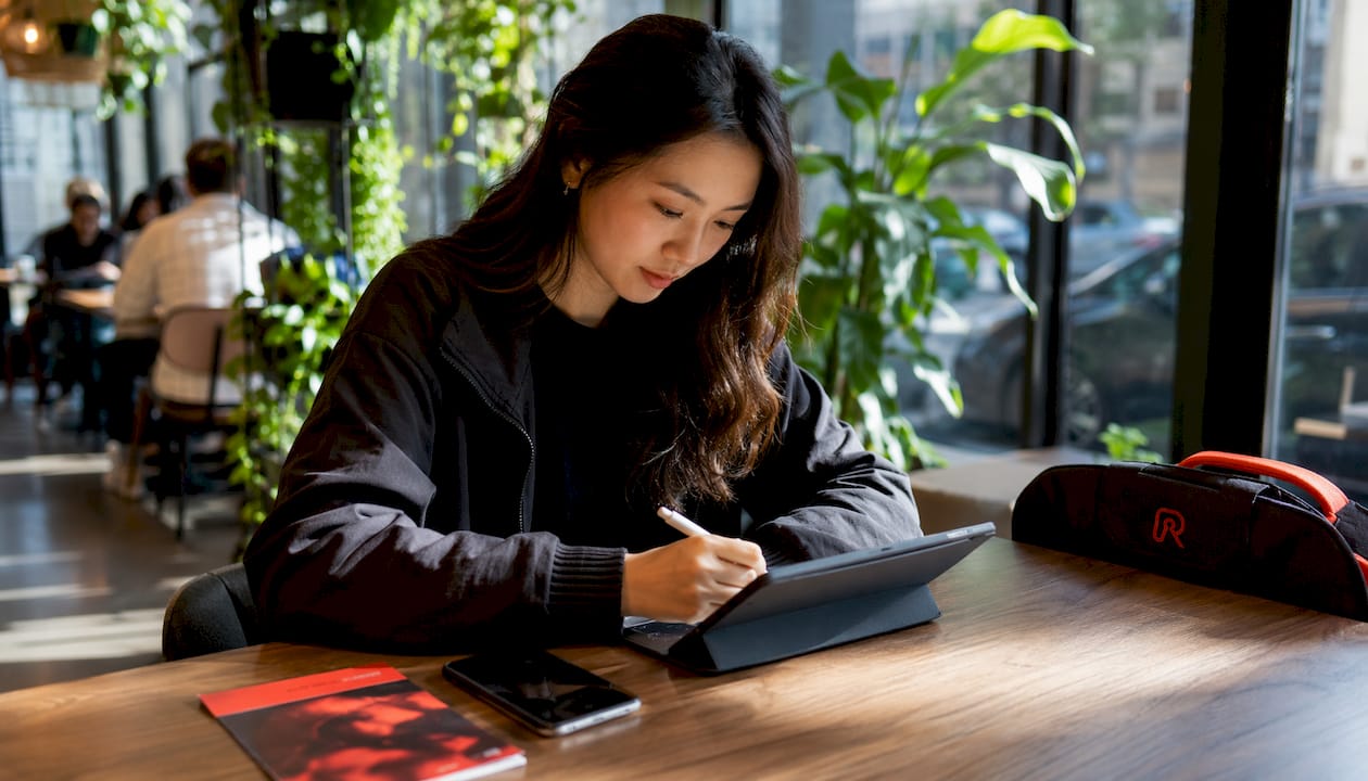 Participant digitally signing waiver on tablet