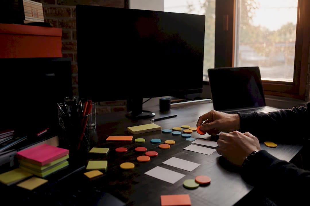 Hands organizing booking tokens in back office