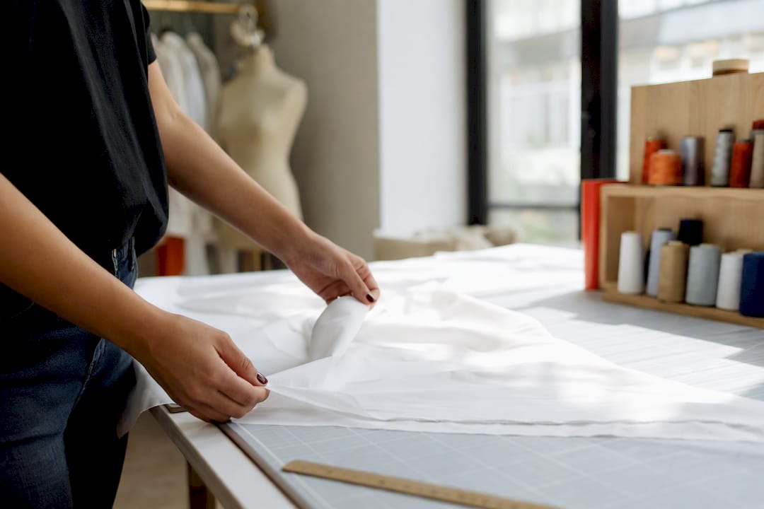 Close-up of poplin fabric texture in hands