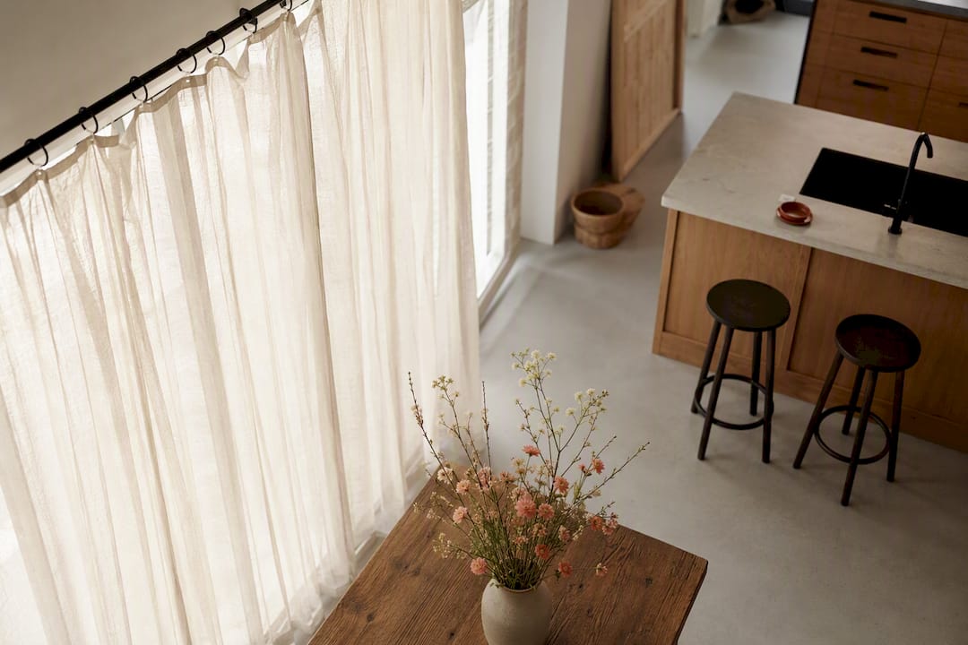Poplin curtains hanging in living room