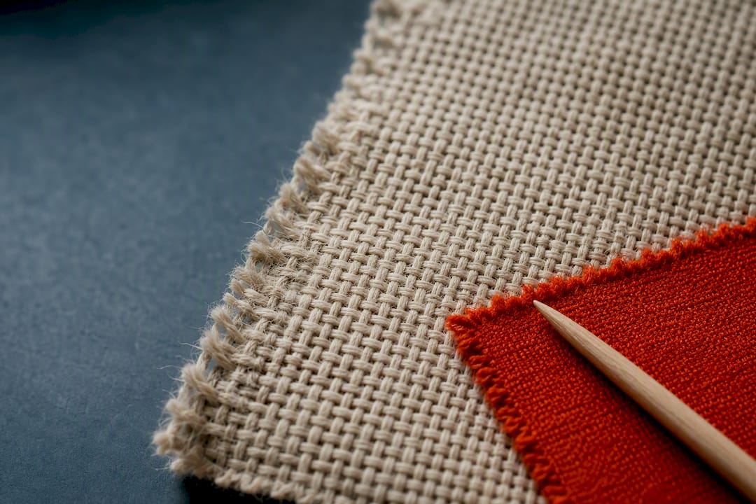 Macro view of interlaced woven fabric threads