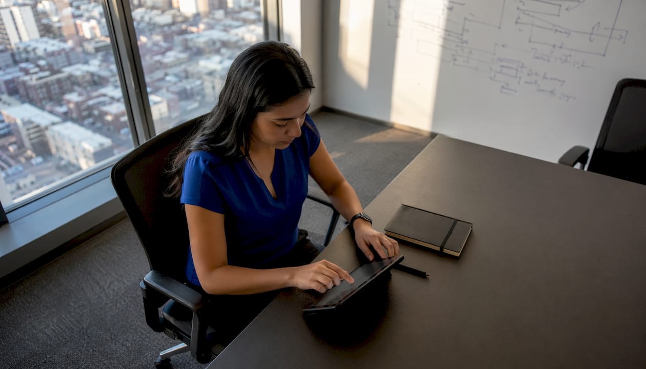 IT specialist typing on keyboard in data center