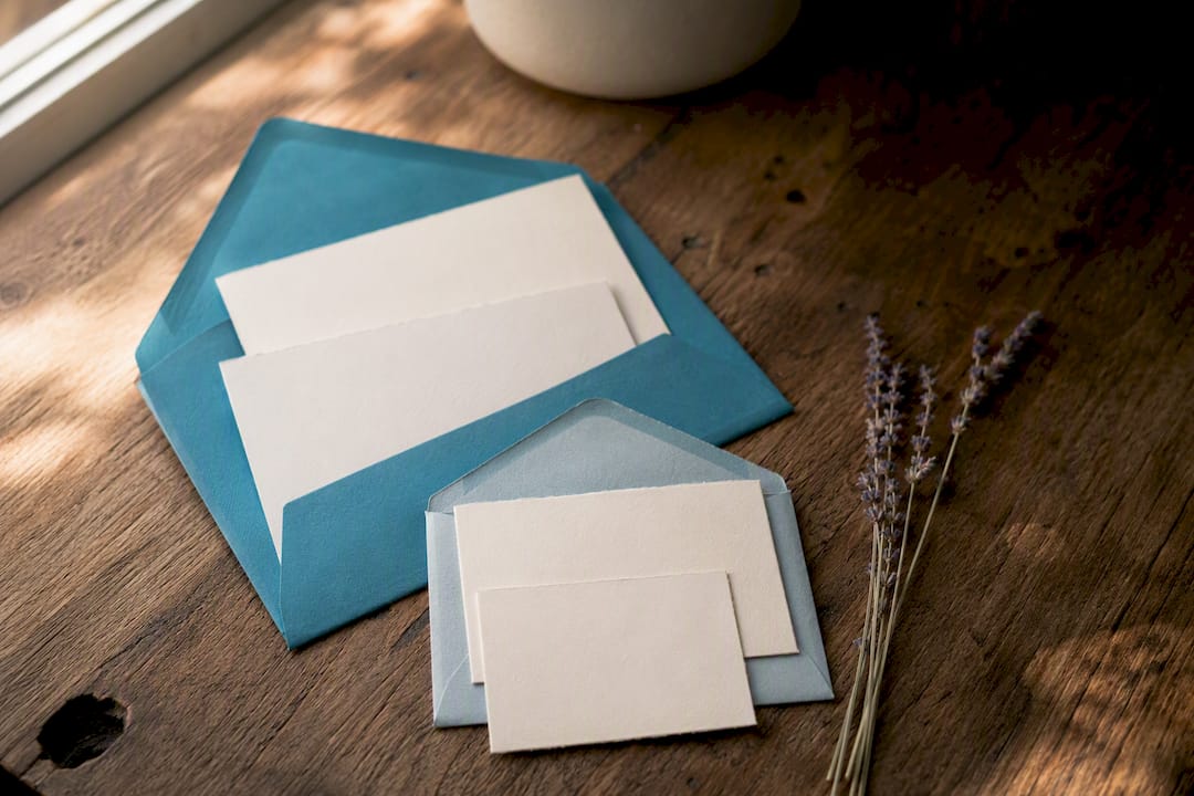 Matching RSVP cards and envelopes close-up