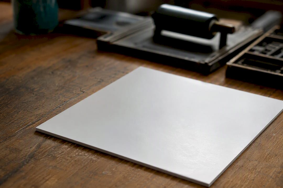 Smooth cardstock near digital press roller