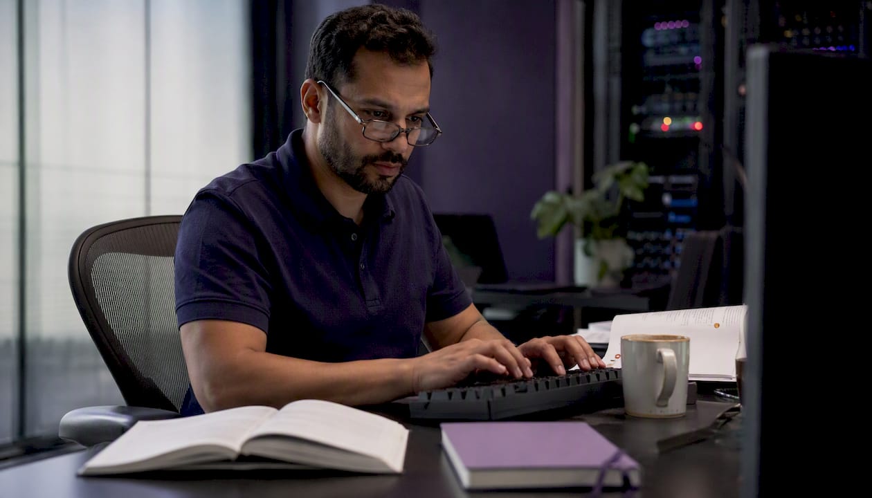 Engineer typing commands securing API gateway