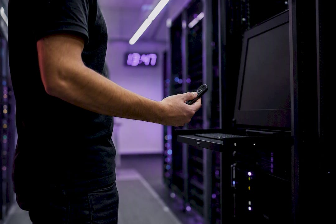 Engineer holding security token near API gateway
