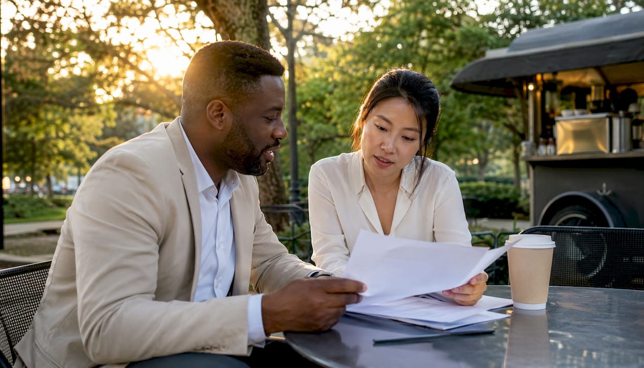 Two marketers discussing ad targeting strategy