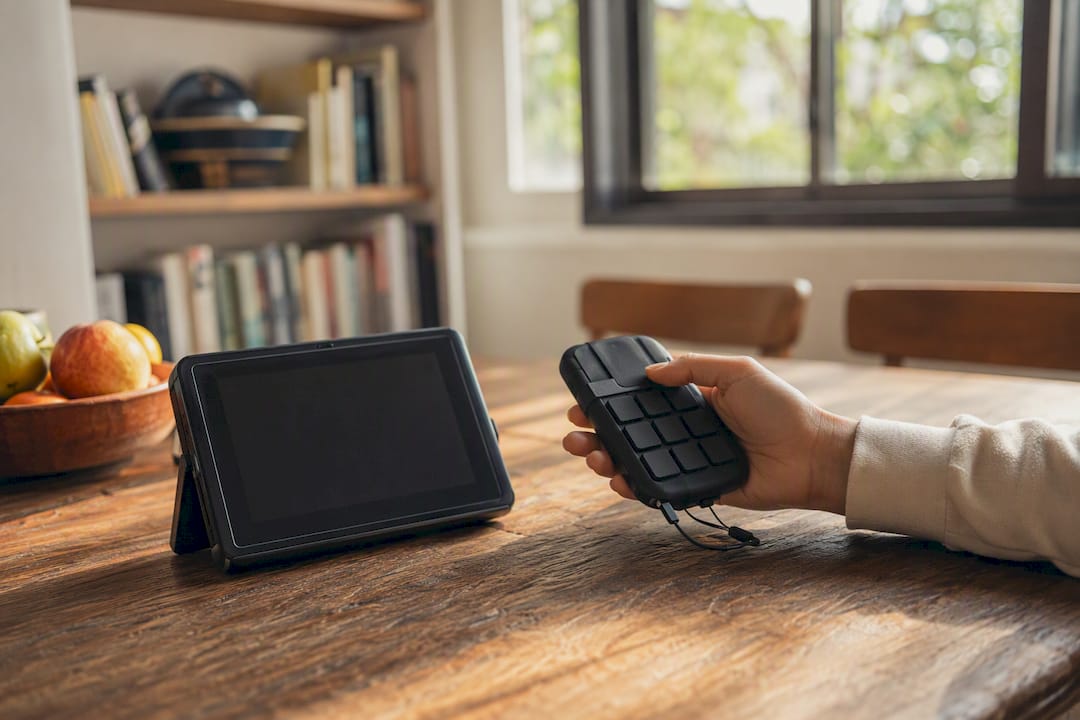 Accessible communication device on family room table