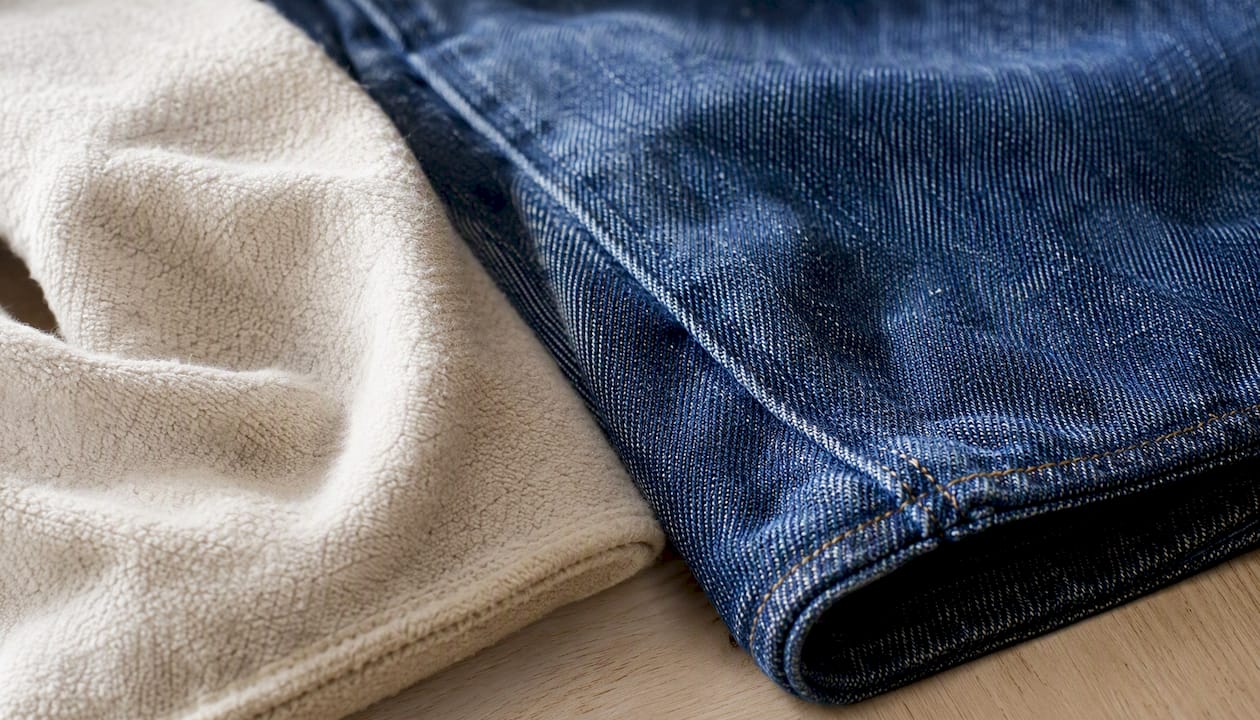 Close-up of cotton fleece and denim fabric textures