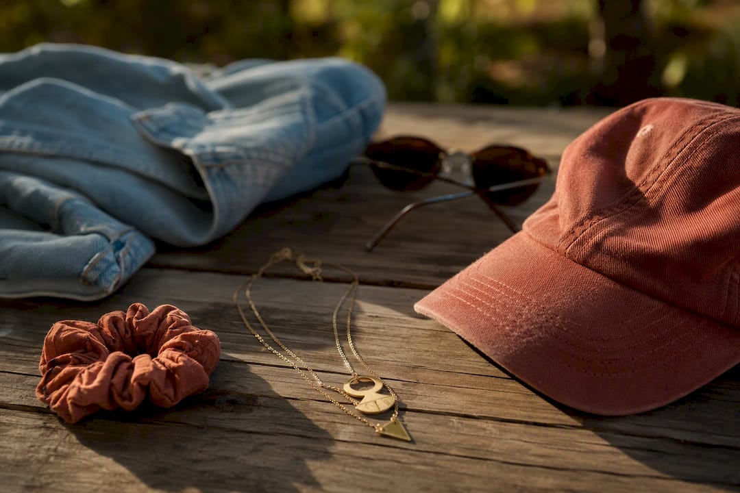 Camp outfit accessories on canvas surface