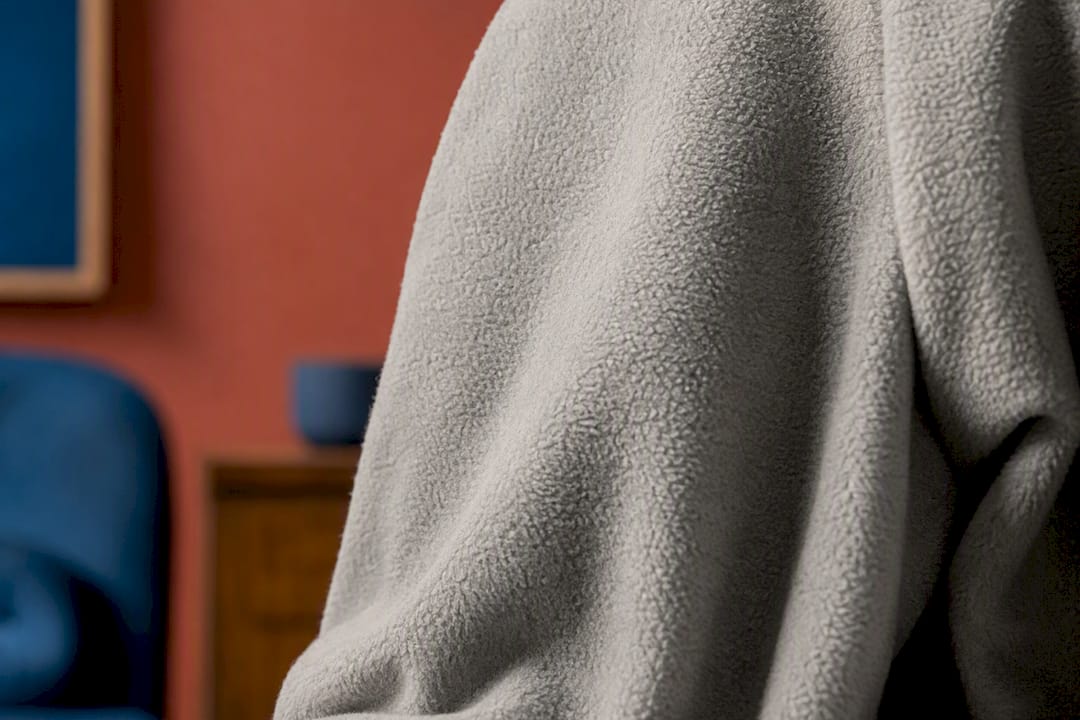 Close-up fabric texture showing stretch and drape
