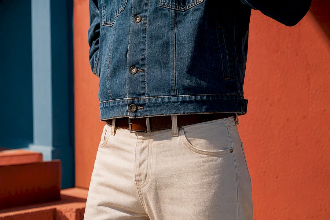 Denim jacket hem aligned with belt line
