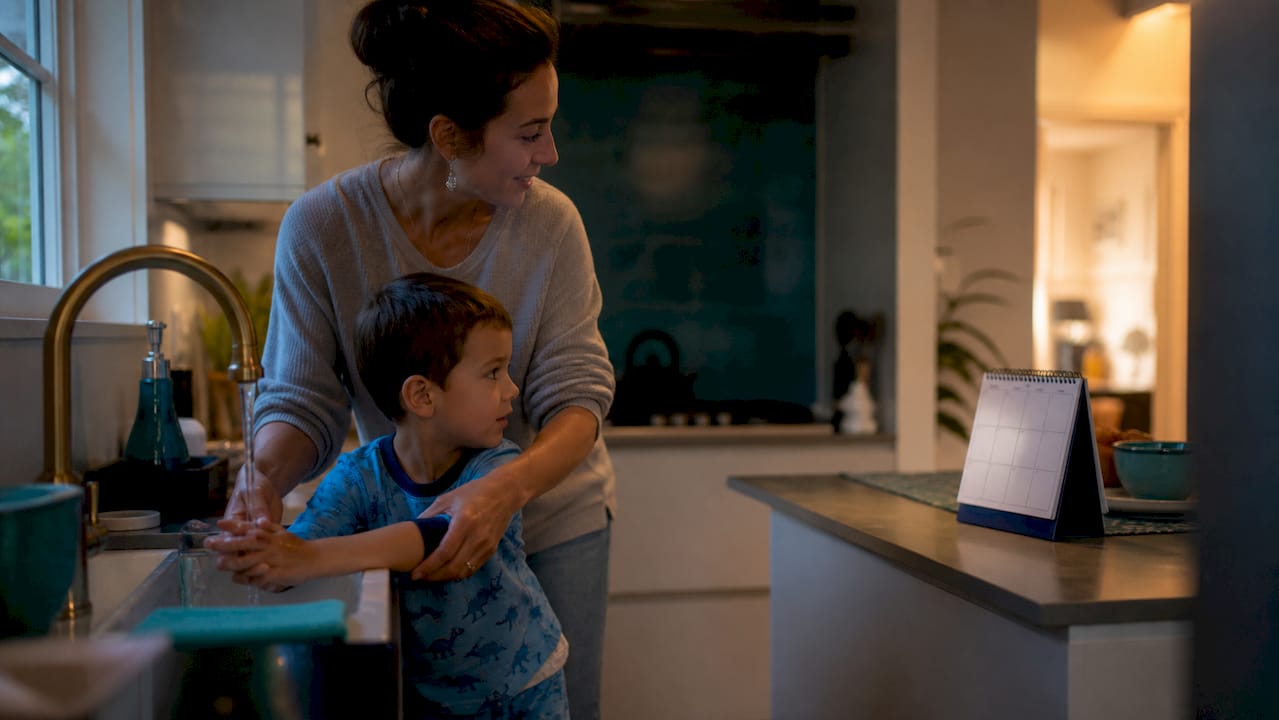 Parent coaching child on bedtime routine