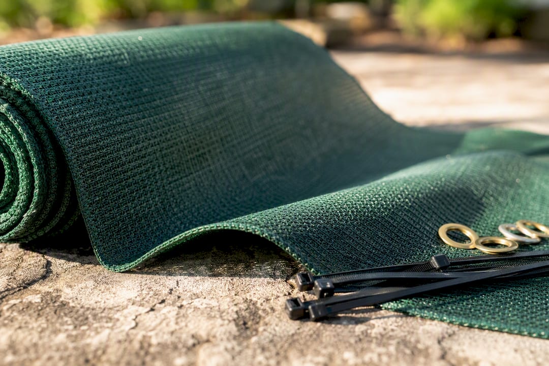 Detailed green shade cloth texture on wooden bench