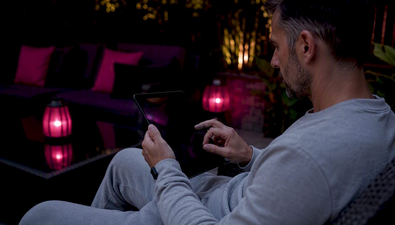 Man vetting profiles with tablet