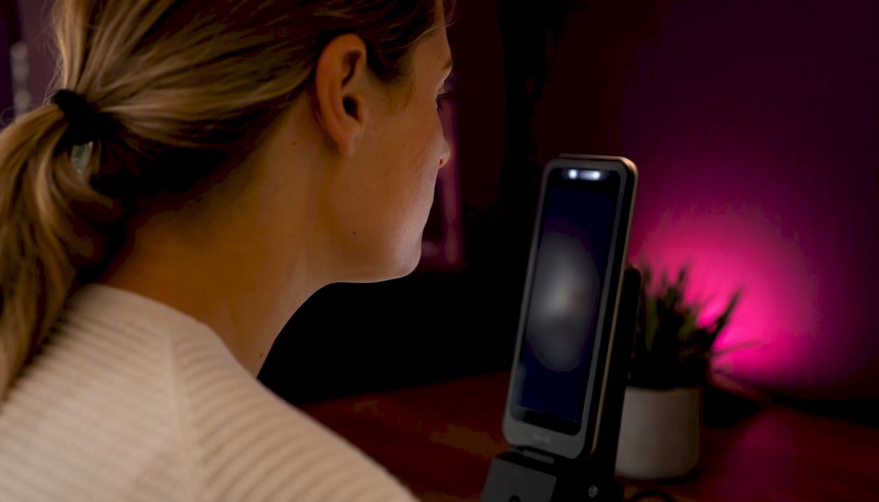 Close-up of facial scan action in private setting